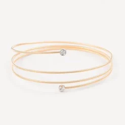 Pulseira espiral em ouro com dois diamantes TOUS ATELIER