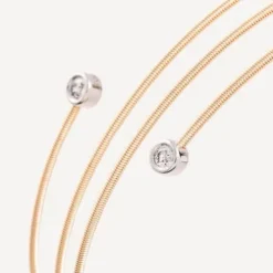Pulseira espiral em ouro com dois diamantes TOUS ATELIER